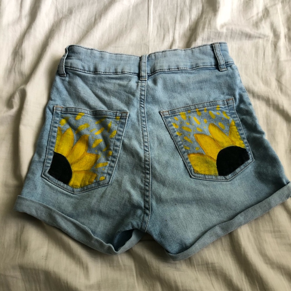 h&m light blue shorts with sunflower pockets